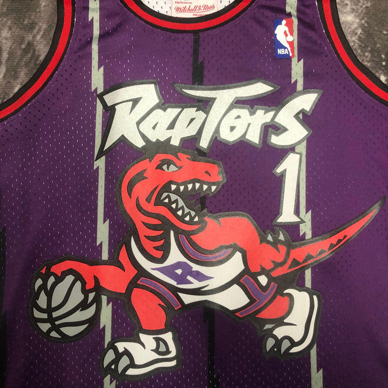 Regata Toronto Raptors Retrô Mitchell & Ness 1998/1999 McGrady Roxa